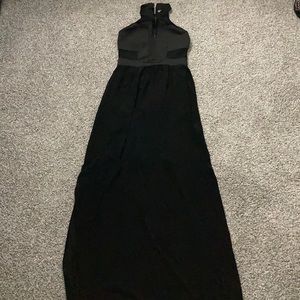 Shoulder less black dress.